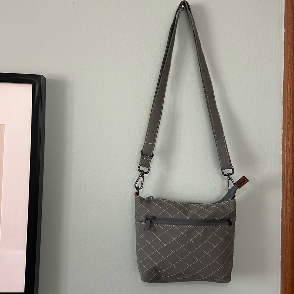 Canvas small cross body bag new with no tag with multiple pockets with zipper